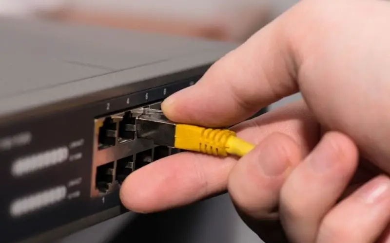 Plugging the network cable to a router